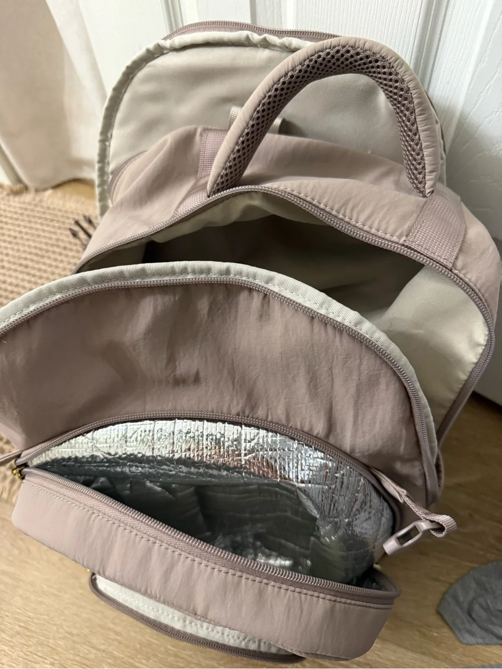 Isaac Mizrahi taupe colored backpack